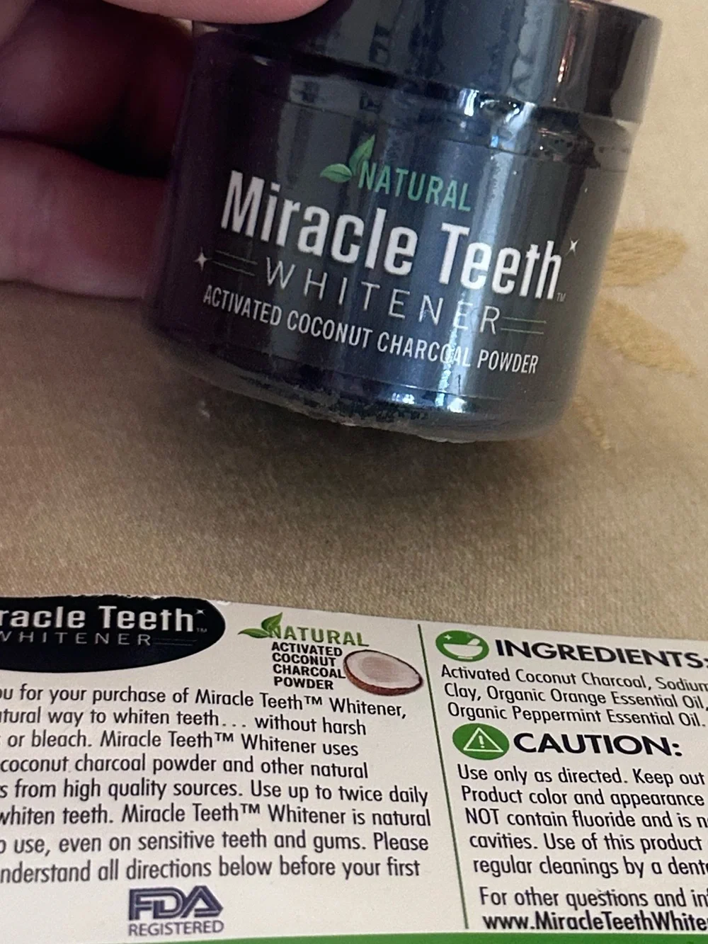 MIRACLE TEETH WHITENER ACTIVATED COCONUT CHARCOAL POWDER.